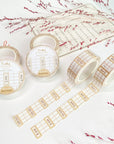 Premium Handmade Washi Tape Time Planner 15mm x 10m - 2 pieces and 6 washi tapes on the table with 2 pink flower branches, a heading chapter