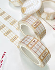 Premium Handmade Washi Tape Time Planner 15mm x 10m - 2 pieces and 5 washi tapes on the table with 2 pink flower branches, a heading chapter