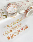 Premium Handmade Washi Tape Vintage Book 15mm x 10m - 3 pieces and 4 washi tapes on the table with a pink flower branch, a heading chapter
