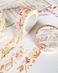 Premium Handmade Washi Tape Vintage Book 15mm x 10m - 3 pieces and 4 washi tapes on the table with a pink flower branch, a heading chapter