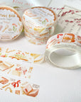 Premium Handmade Washi Tape Vintage Book 15mm x 10m - 3 pieces and 4 washi tapes on the table with a pink flower branch, a heading chapter