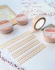 Premium Handmade Washi Tape Warm Heart 15mm x 10m - 4 pieces and 4 washi tapes on the table with 2 dark maroon flower branches, a sticker sheet, a chapter heading