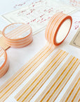 Premium Handmade Washi Tape Warm Line 15mm x 10m - 4 pieces and 3 washi tapes on the table with a dark maroon flower branch, a chapter heading