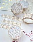 Premium Handmade Washi Tape White & Brown Grid 15mm x 10m - 3 pieces and 4 washi tapes on the table with a dark pink flower branch, a chapter heading, a sticker sheet