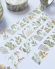 Premium Handmade Washi Tape Wild Leaf 15mm x 10m - 4 pieces and 3 washi tapes on the table with a white flower branch