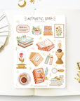 Premium Handmade Sticker Sheet Aesthetic Book 105mm x 148mm - a sheet on the table with a white flower branch, an opened notebook