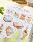 Premium Handmade Sticker Sheet Aesthetic Book 105mm x 148mm - a sheet on the table with a branch, an opened notebook