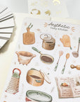 Premium Handmade Sticker Sheet Aesthetic Cozy Kitchen 105mm x 148mm - a sheet on the table with an opened notebook