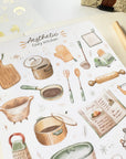 Premium Handmade Sticker Sheet Aesthetic Cozy Kitchen 105mm x 148mm - a sheet on the table with a pencil, an opened notebook