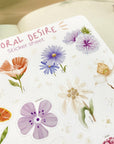 Premium Handmade Sticker Sheet Floral Desire 105mm x 148mm - a sheet on the table with an opened notebook