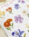 Premium Handmade Sticker Sheet Floral Desire 105mm x 148mm - a sheet on the table with an opened notebook