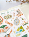 Premium Handmade Sticker Sheet Into The Wild 105mm x 148mm - a sheet on the table with a white flower branch, an opened notebook, a washi tape