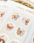 Premium Handmade Sticker Sheet Magic Wings 105mm x 148mm - 3 sheets on the table