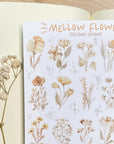 Premium Handmade Sticker Sheet Mellow Flower 105mm x 148mm - a sheet on the table with a white flower branch, an opened notebook