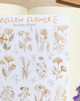 Premium Handmade Sticker Sheet Mellow Flower 105mm x 148mm - a sheet on the table with a purple flower branch, an opened notebook