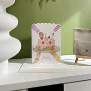 Happy Birthday — greeting card displayed on a shelf