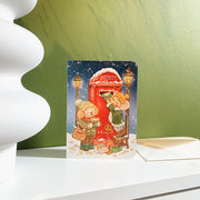 Sending Post Christmas card, styled on a shelf with its envelope