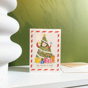 You Wanted a Tree Christmas card, English front, styled on a shelf with its envelope