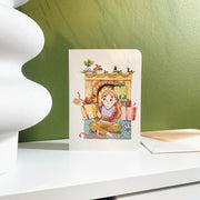 You Wrapped That Yourself Christmas card, styled on a shelf with its envelope
