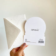Back of the card with the Tuk Tuk & Stroop collection mark, FSC paper and the envelope