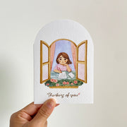 Thinking of You — greeting card held in hand