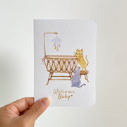 Welcome Baby — greeting card held in hand