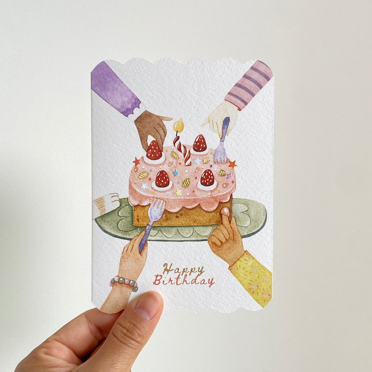 Happy Birthday — greeting card held in hand