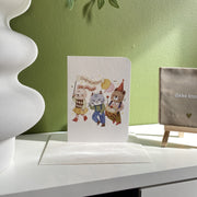 Congratulations — greeting card displayed on a shelf