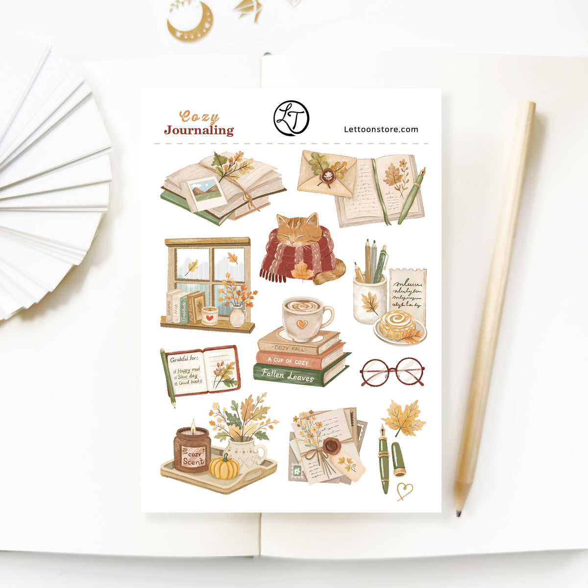 Cozy Journaling sticker sheet with books, letters, coffee and a cat in a scarf