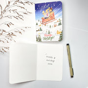 In Case We Don't Stop Christmas card opened, English front with the blank inside and a pen