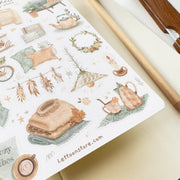 Premium Handmade Sticker Sheet 
Aesthetic Cozy 105mm x 148mm - a sheet on the table with a pencil, an opened notebook