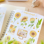 Premium Handmade Sticker Sheet Chamomile Sunflower 105mm x 148mm - a sheet on the table with an opened notebook
