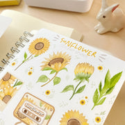 Premium Handmade Sticker Sheet Chamomile Sunflower 105mm x 148mm - a sheet on the table with a rabbit statue