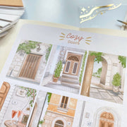 Premium Handmade Sticker Sheet Cozy Doors 105mm x 148mm - a sheet on the table 