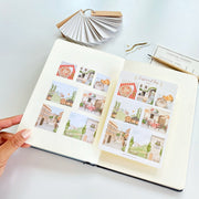 Premium Handmade Sticker Sheet Inspired by Italy 105mm x 148mm - 7 pieces and a sheet on the table with a pencil, an opened notebook, a chapter heading