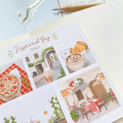 Premium Handmade Sticker Sheet Inspired by Italy 105mm x 148mm - a sheet on the table with an opened notebook