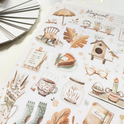 Premium Handmade Sticker Sheet Magical Cozy Fall 105mm x 148mm - a sheet on the table 