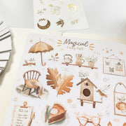 Premium Handmade Sticker Sheet Magical Cozy Fall 105mm x 148mm - a sheet on the table with an opened notebook