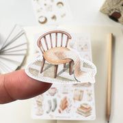 Premium Handmade Sticker Sheet Magical Cozy Fall 105mm x 148mm - a piece and a sheet on the table with a pencil