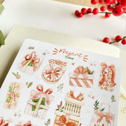 Premium Handmade Sticker Sheet Present Time 105mm x 148mm - a sheet on the table with a red berry branch, an opened notebook