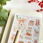 Premium Handmade Sticker Sheet Present Time 105mm x 148mm - a piece on the stick and a sheet on the table with a red berry branch, leaves, an opened notebook