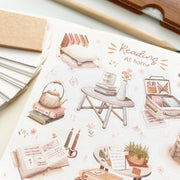 Premium Handmade Sticker Sheet Reading at Home 105mm x 148mm - a sheet on the table with a pencil