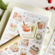 Premium Handmade Sticker Sheet 
Reading in the Winter 105mm x 148mm -  a piece and a sheet on the table with a branch, a red berry branch