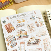 Premium Handmade Sticker Sheet Reading Time 105mm x 148mm - a sheet on the table with an opened notebook