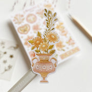Premium Handmade Sticker Sheet Romantic Flower 105mm x 148mm - a piece and a sheet on the table with a pencil