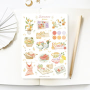 Premium Handmade Sticker Sheet Summer Breeze 105mm x 148mm - a sheet on the table with a pencil, an opened notebook