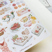 Premium Handmade Sticker Sheet Summer Breeze 105mm x 148mm - a sheet on the table with an opened notebook
