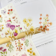 Premium Handmade Sticker Sheet Wild Flower 105mm x 148mm - 3 pieces on the stick and a sheet on the table 