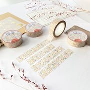Premium Handmade Washi Tape Blooming Flower 15mm x 10m - 4 pieces and 4 washi tapes on the table with 2 dark maroon branches, a sticker sheet, a chapter heading
