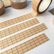 Premium Handmade Washi Tape Brown Grid 15mm x 10m - 4 pieces and 3 washi tapes on the table